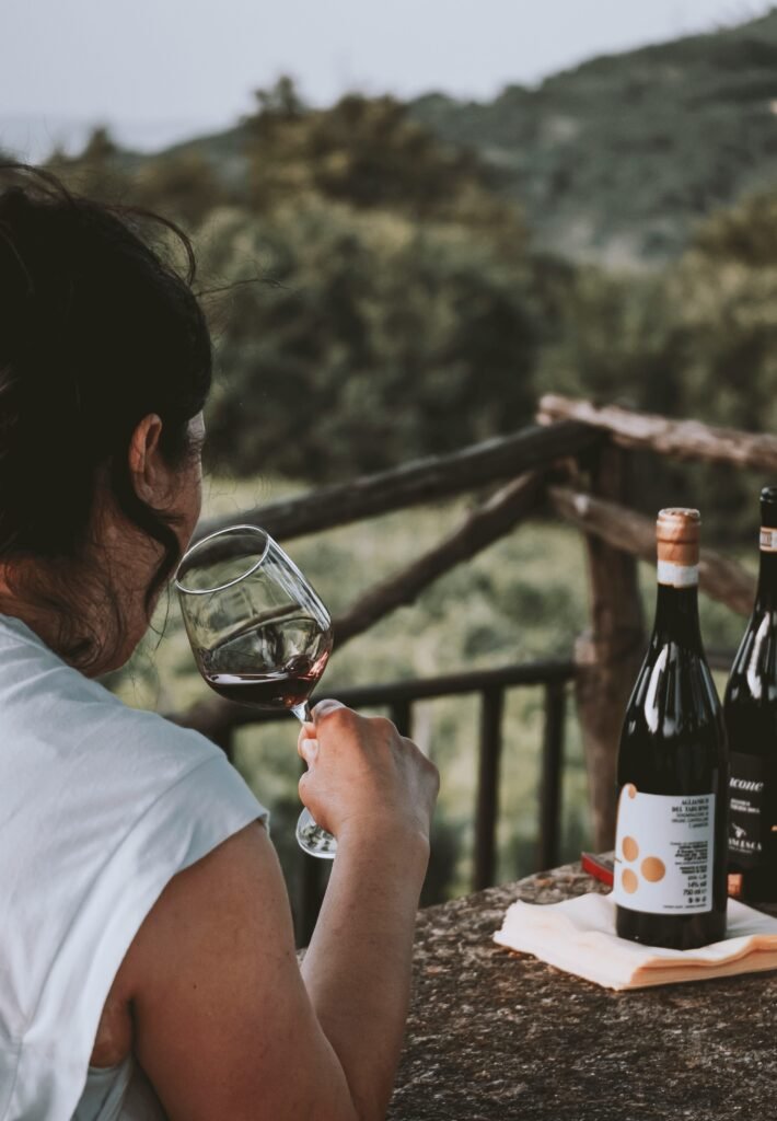 a man drinking wine